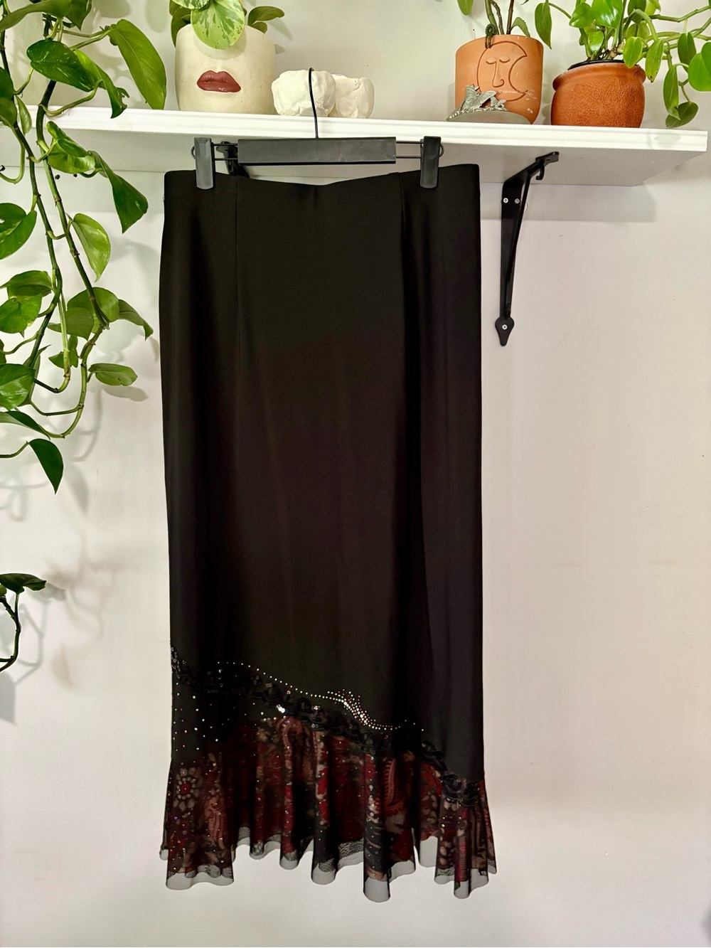 Elegant Black Midi Skirt with Printed Ruffle Hem